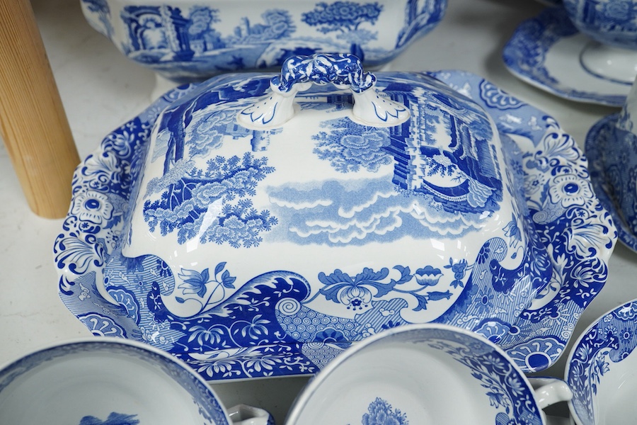 A quantity of Spode Italian dinner ware to include tureens, twin handled soup dishes and platters and a circular bread plate, largest 35cm wide